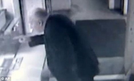John Wheeler stumbling and disoriented in parking garage security footage shortly before his murder