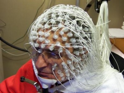 Electroencephalography equipment monitoring brain wave activity through the scalp