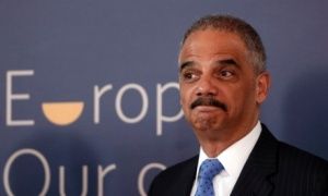 Former Attorney General Eric Holder who oversaw zero Wall Street criminal prosecutions during the 2008 financial crisis